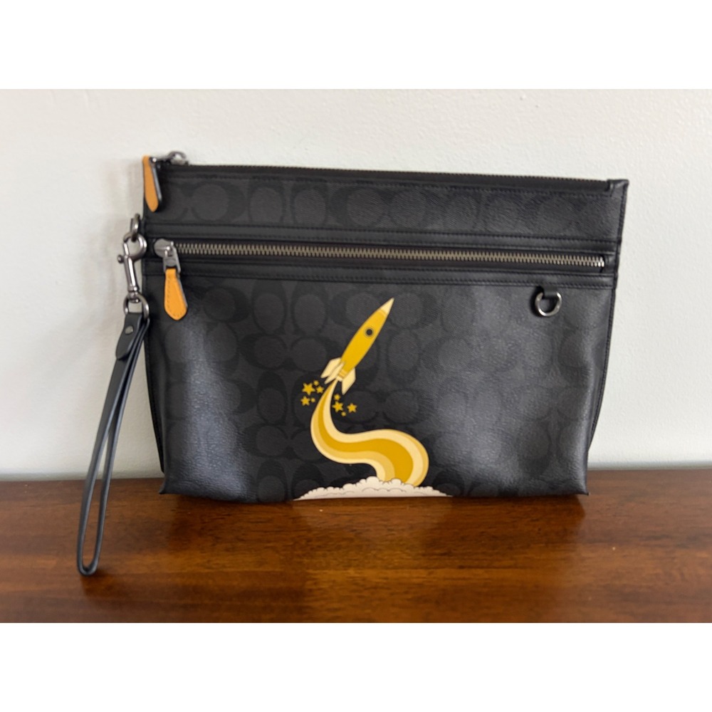 Coach Carryall Pouch In Signature Canvas With Triumph Motif Rocket EUC